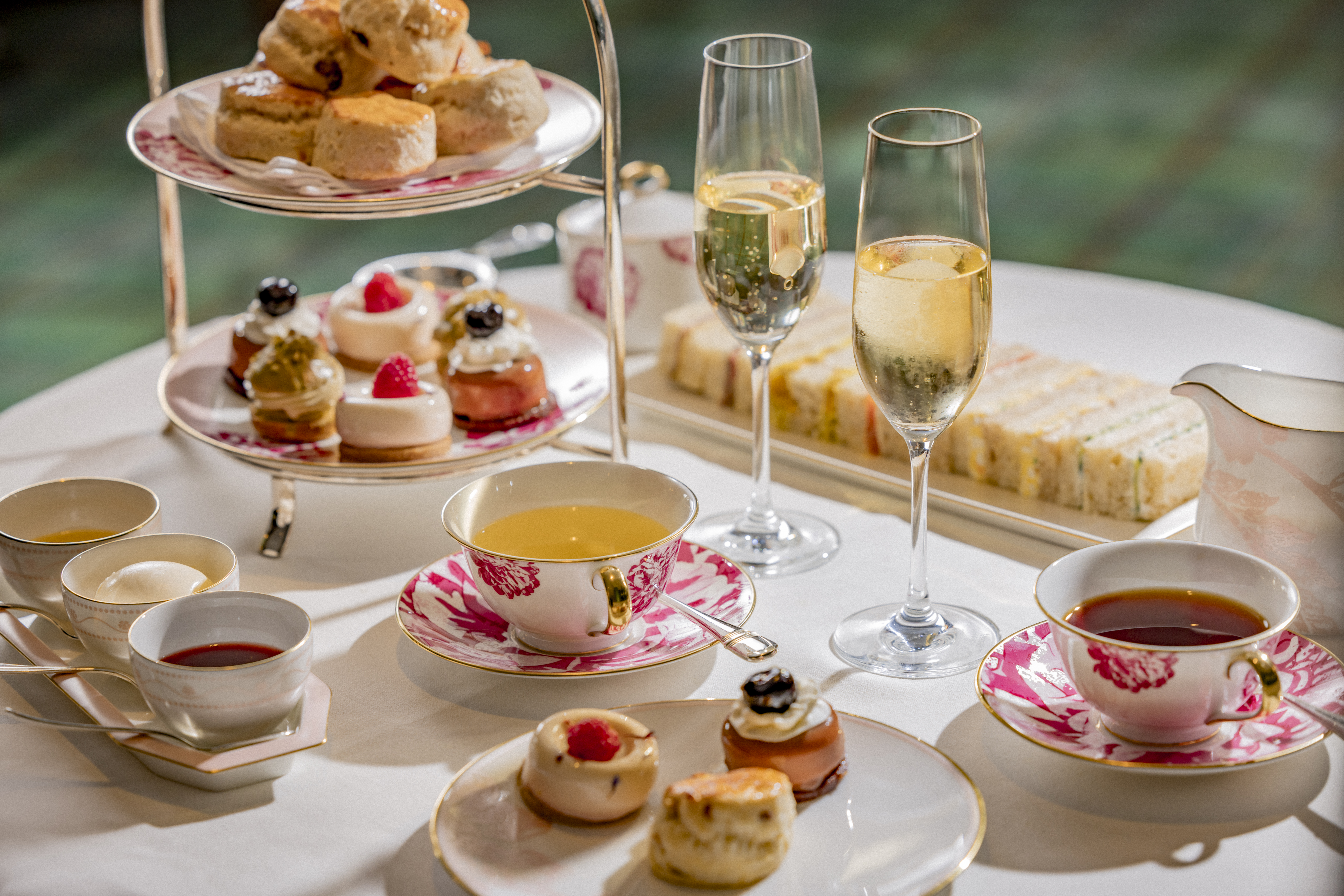 Pink and white floral china with tiered platter of sweets and bites for Afternoon Tea in Beverly Hills
