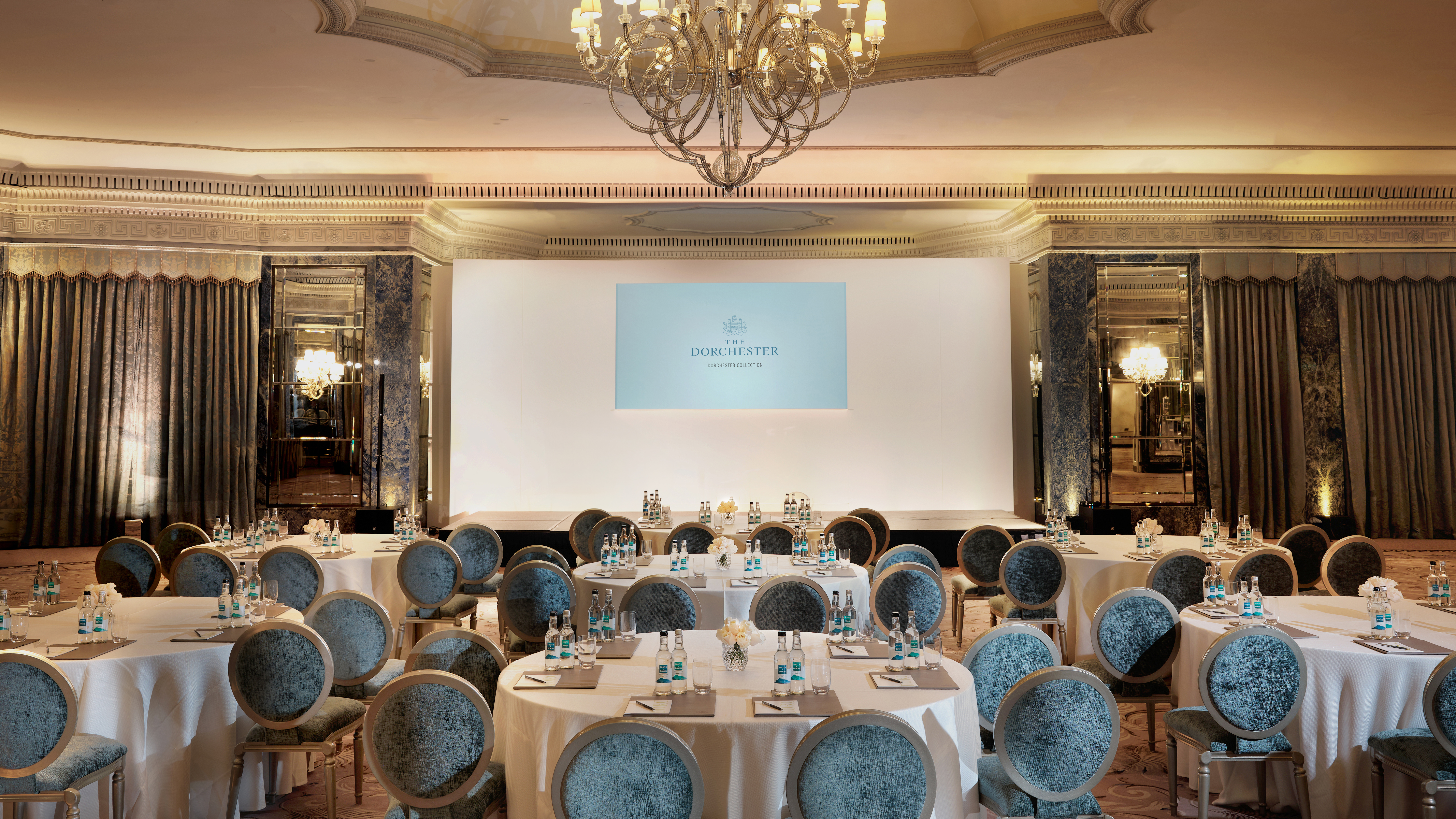 The Dorchester ballroom set for event with stage and AV