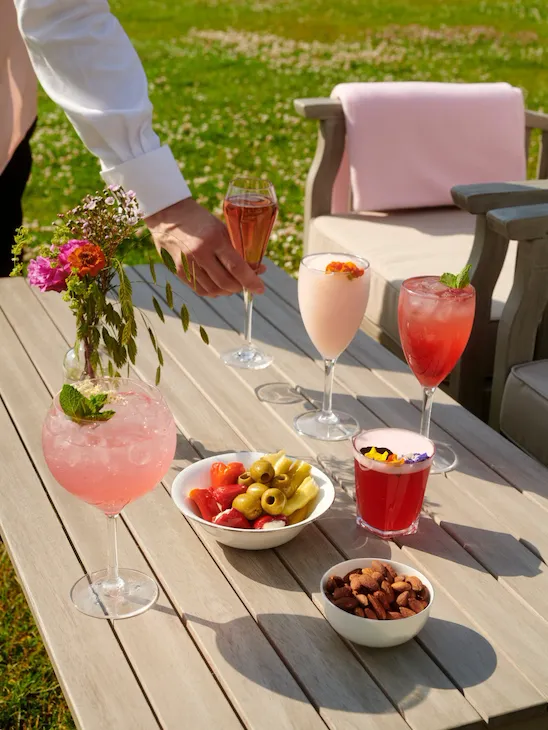 Afternoon sunlight on the Rose Lawn Bar at Coworth Park
