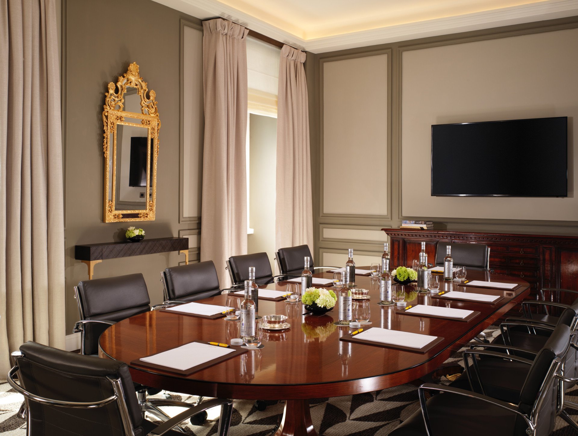 Sala Ludovisi boardroom with screen on wall at Hotel Eden, Rome