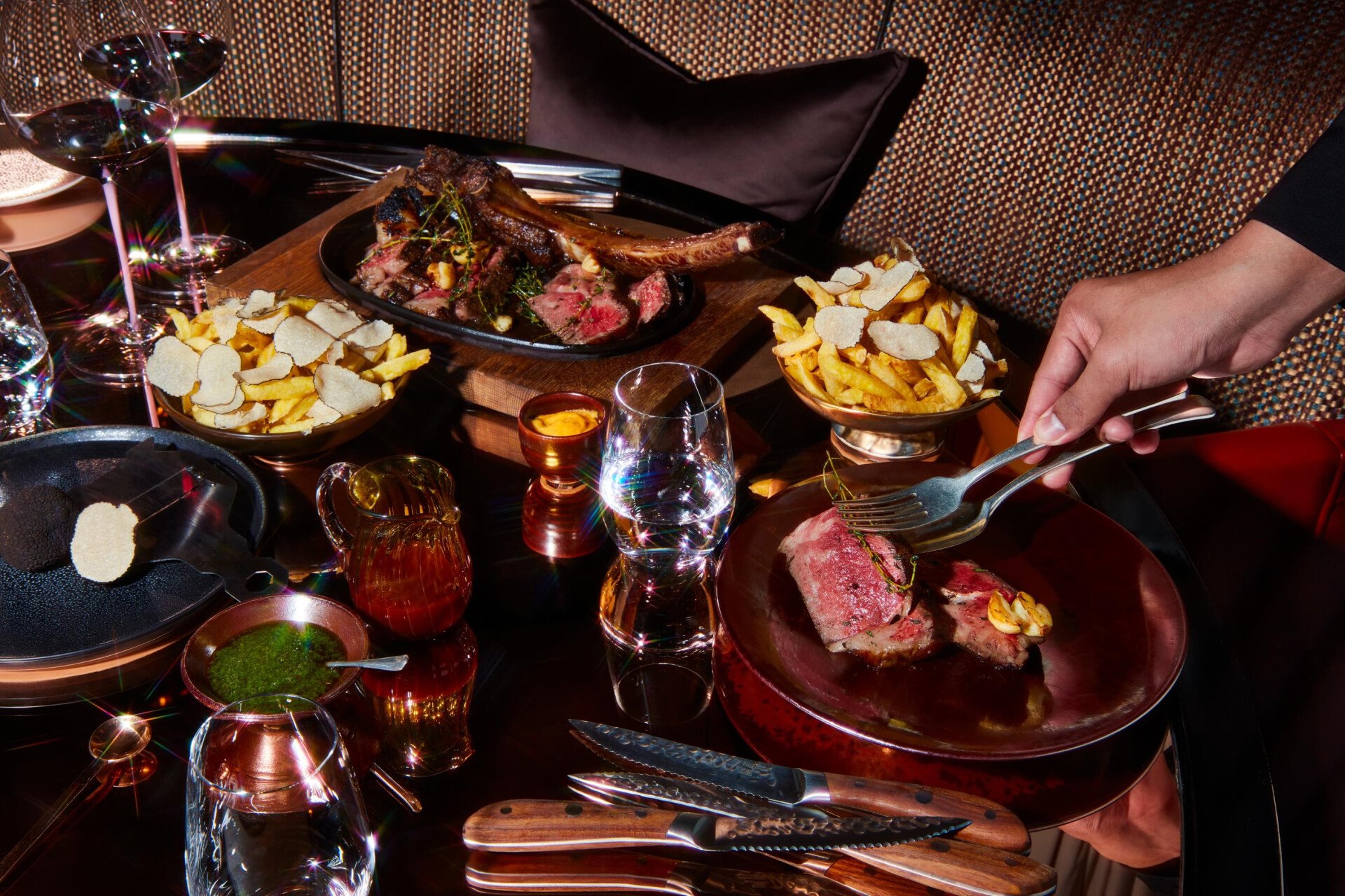 Dinner Menu at CUT served in a fabulous setting with flowers on the table