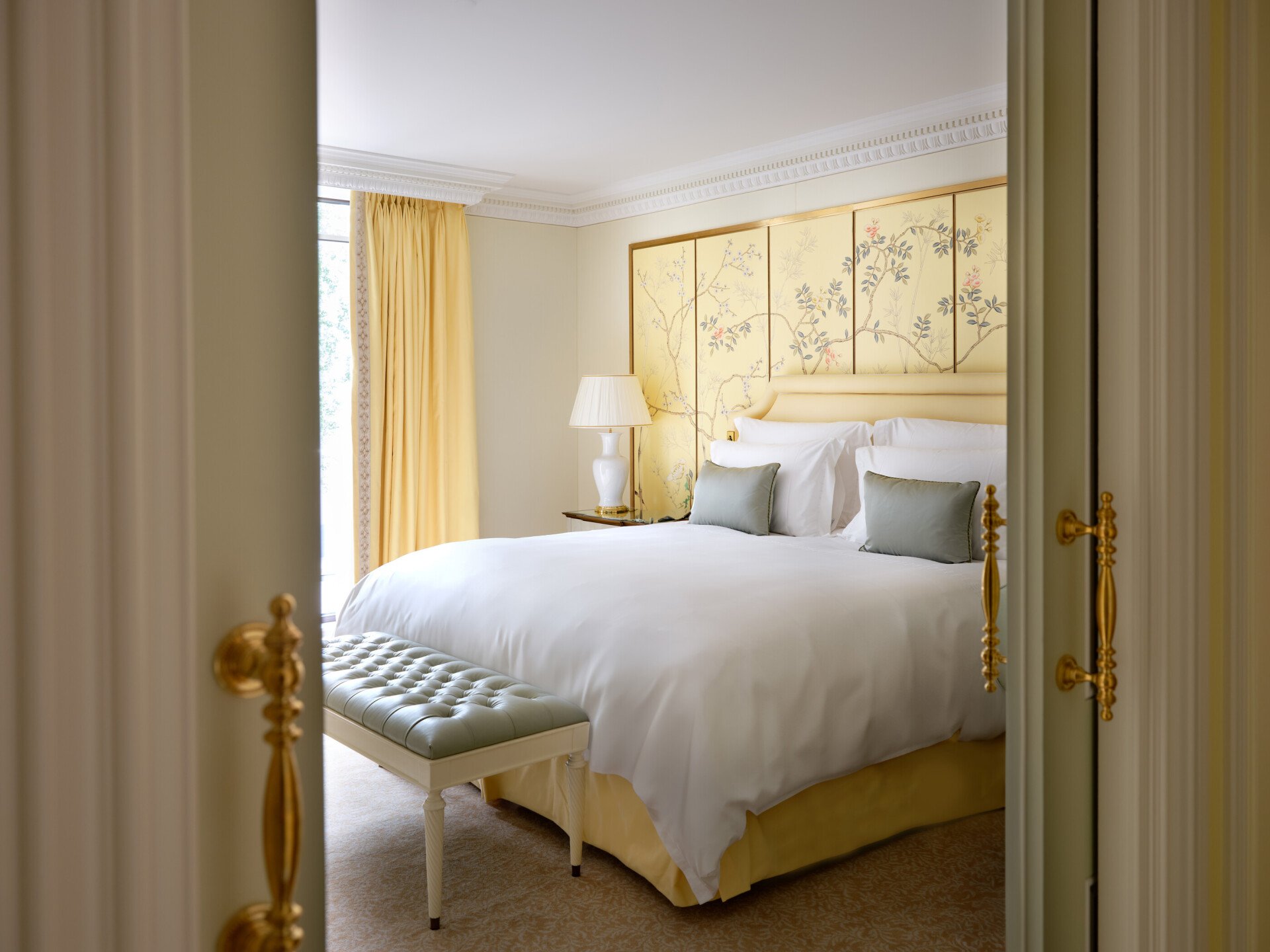 A light and airy bedroom with elegant decorative touches