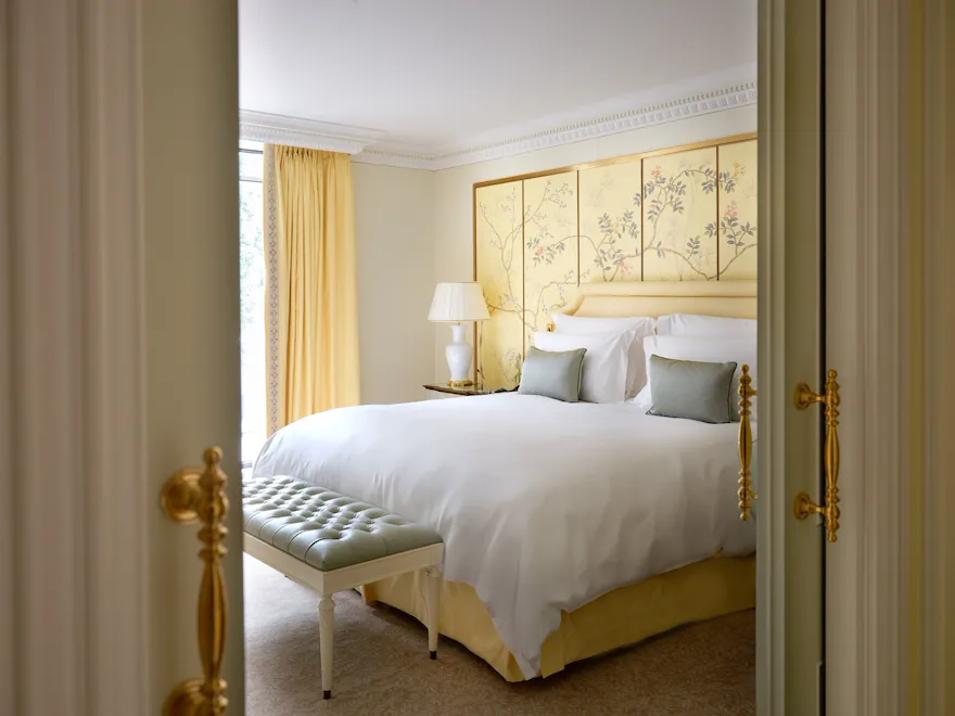 A light and airy bedroom with elegant decorative touches