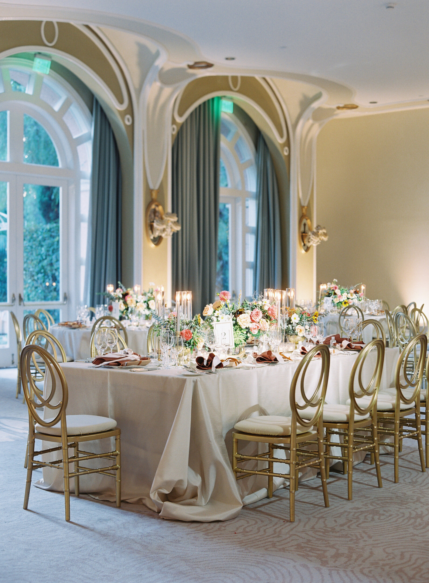 Private event with elegant table setting and natural light in the Crystal Ballroom at The Beverly Hills Hotel