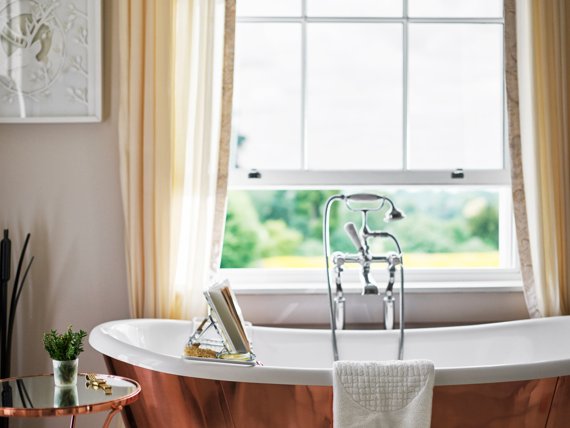 Coworth Park-Mansion House Junior Suite bathroom view out of the window over the grounds