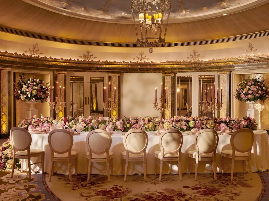 The Dorchester Gold and Silver event space set of fabulous evening event with a stunning floral centre perice