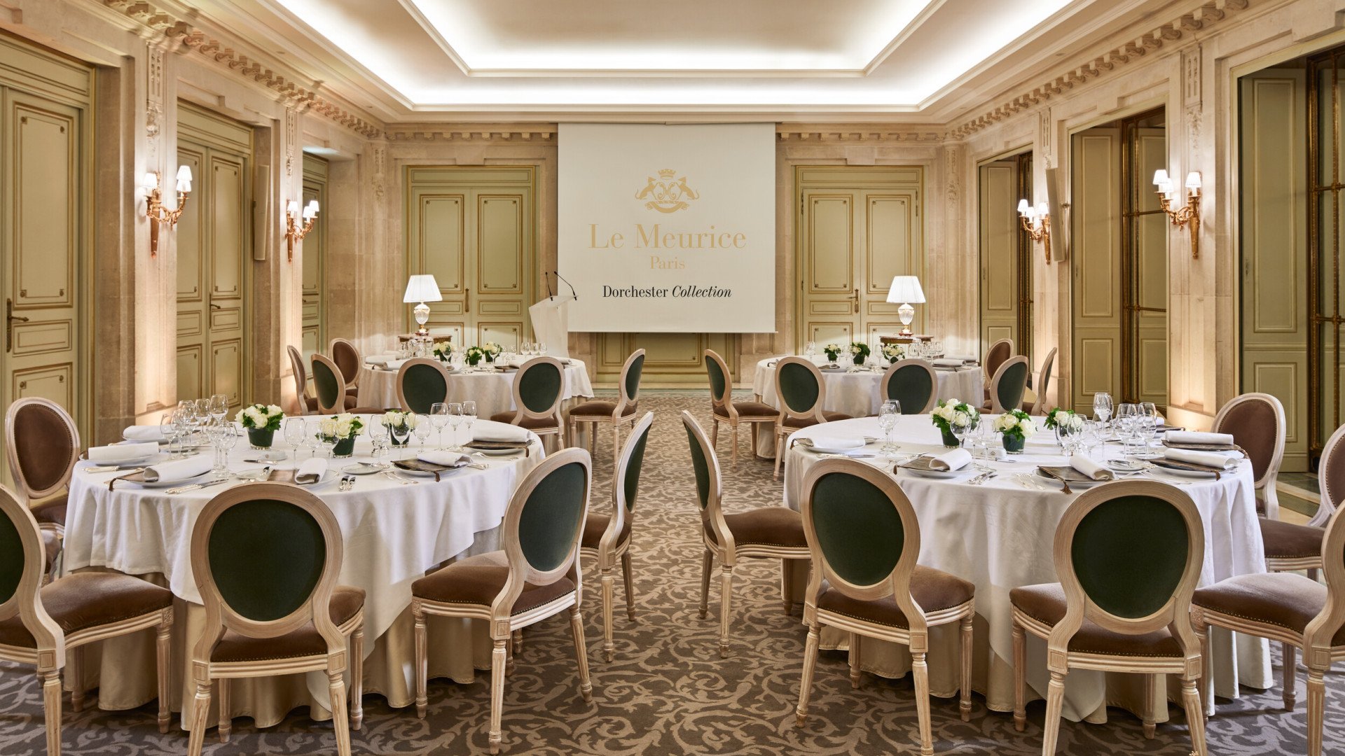Salon Tuileries showing four tables and a dashboard for a meeting at Le Meurice