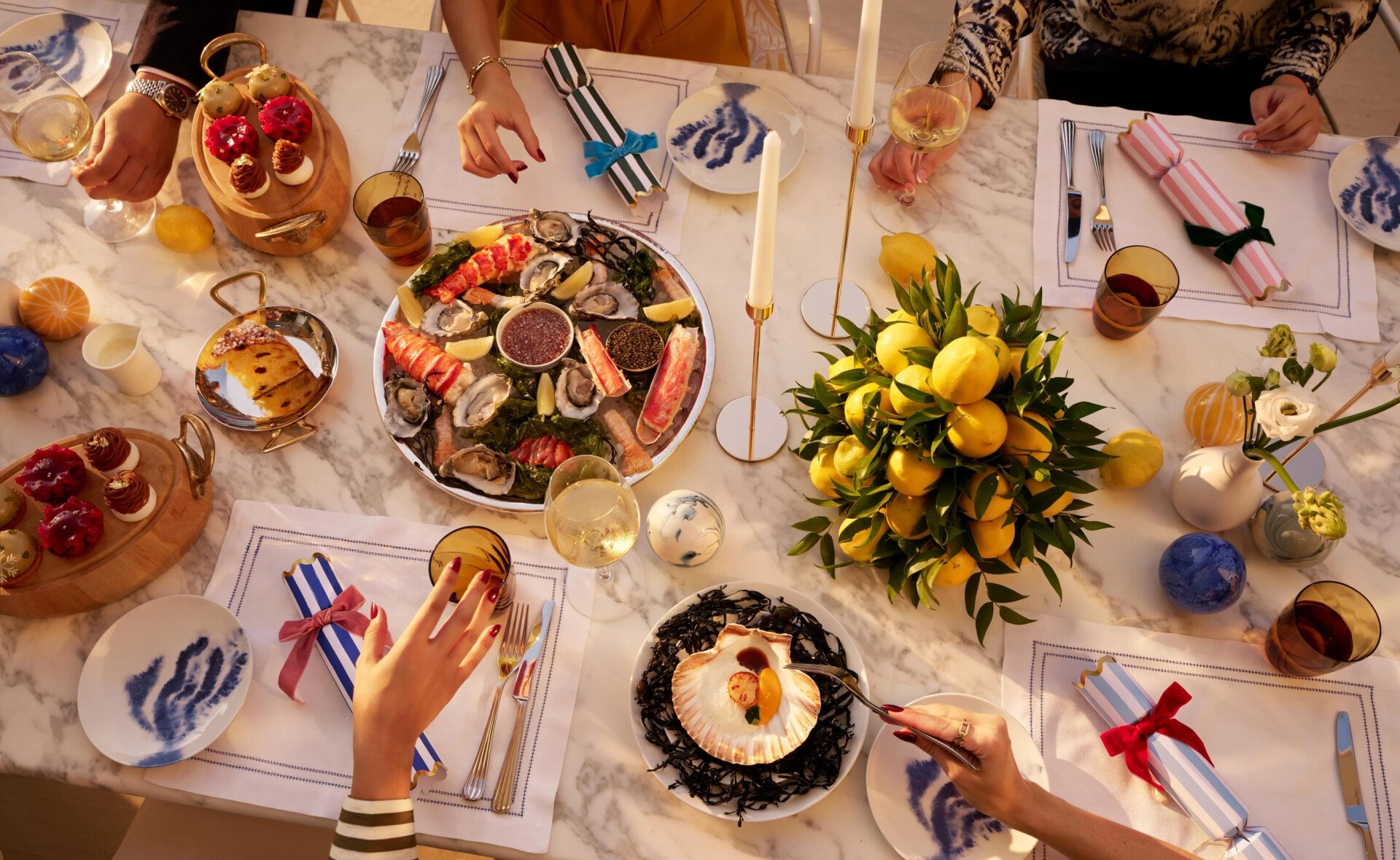 People having festive lunch outdoors in Riviera by Jean Imbert