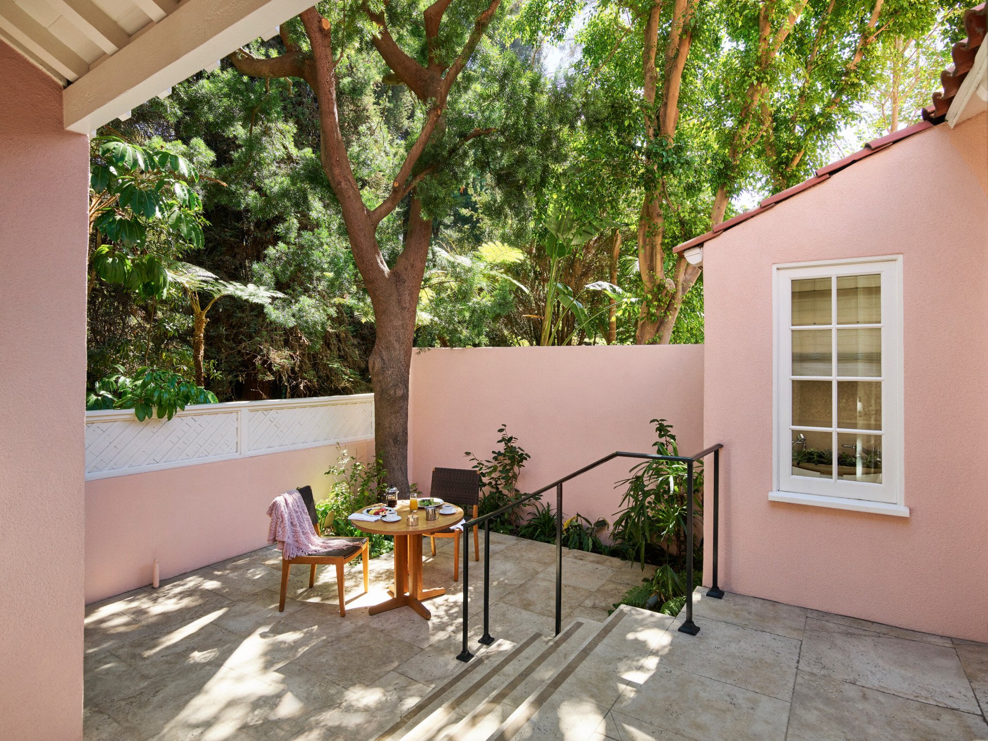 Breakfast set-up for two on the patio of the signature Grand Suite at Hotel Bel-Air. 
