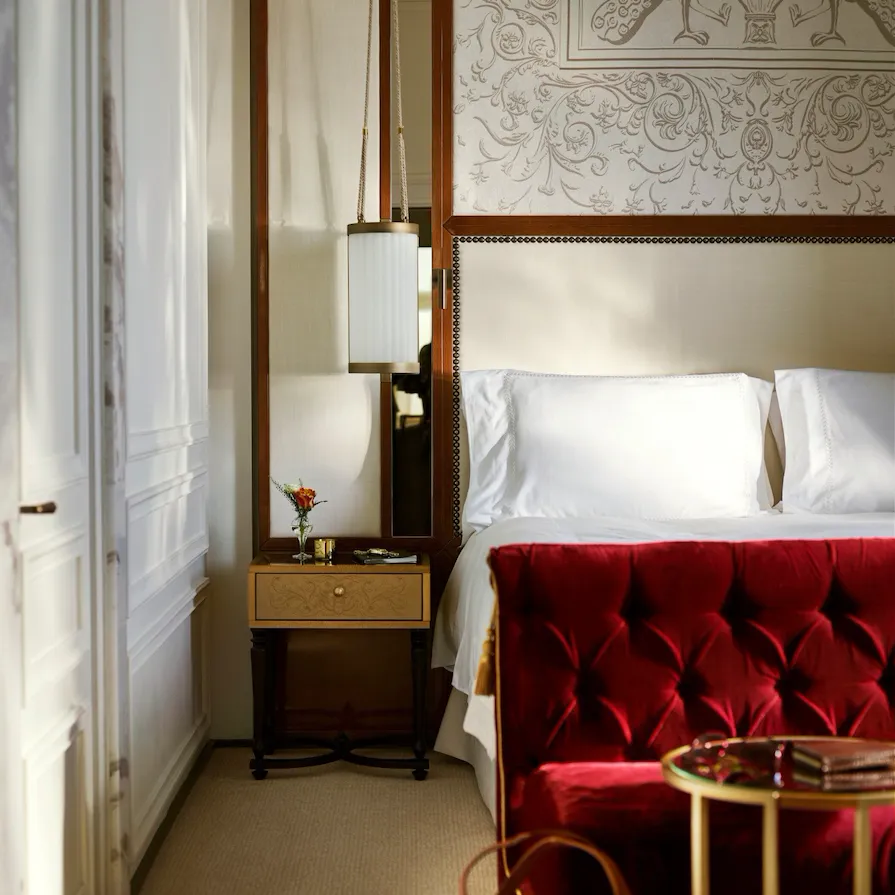 Elegant bedroom of Dolce Vita Suite at Hotel Eden, Rome