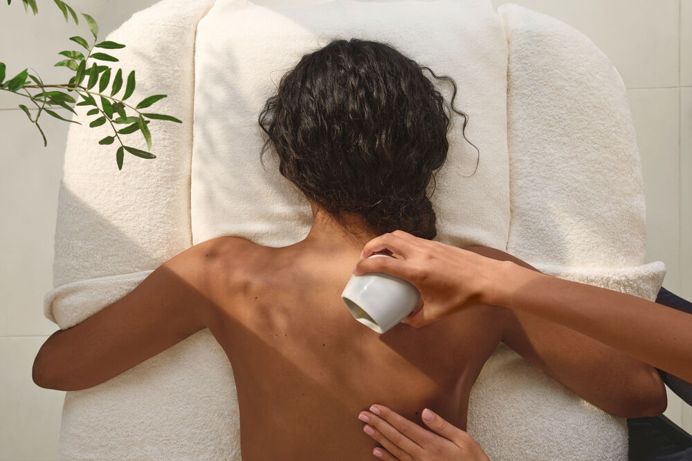 Massage being completed on female model The Spa at Coworth Park