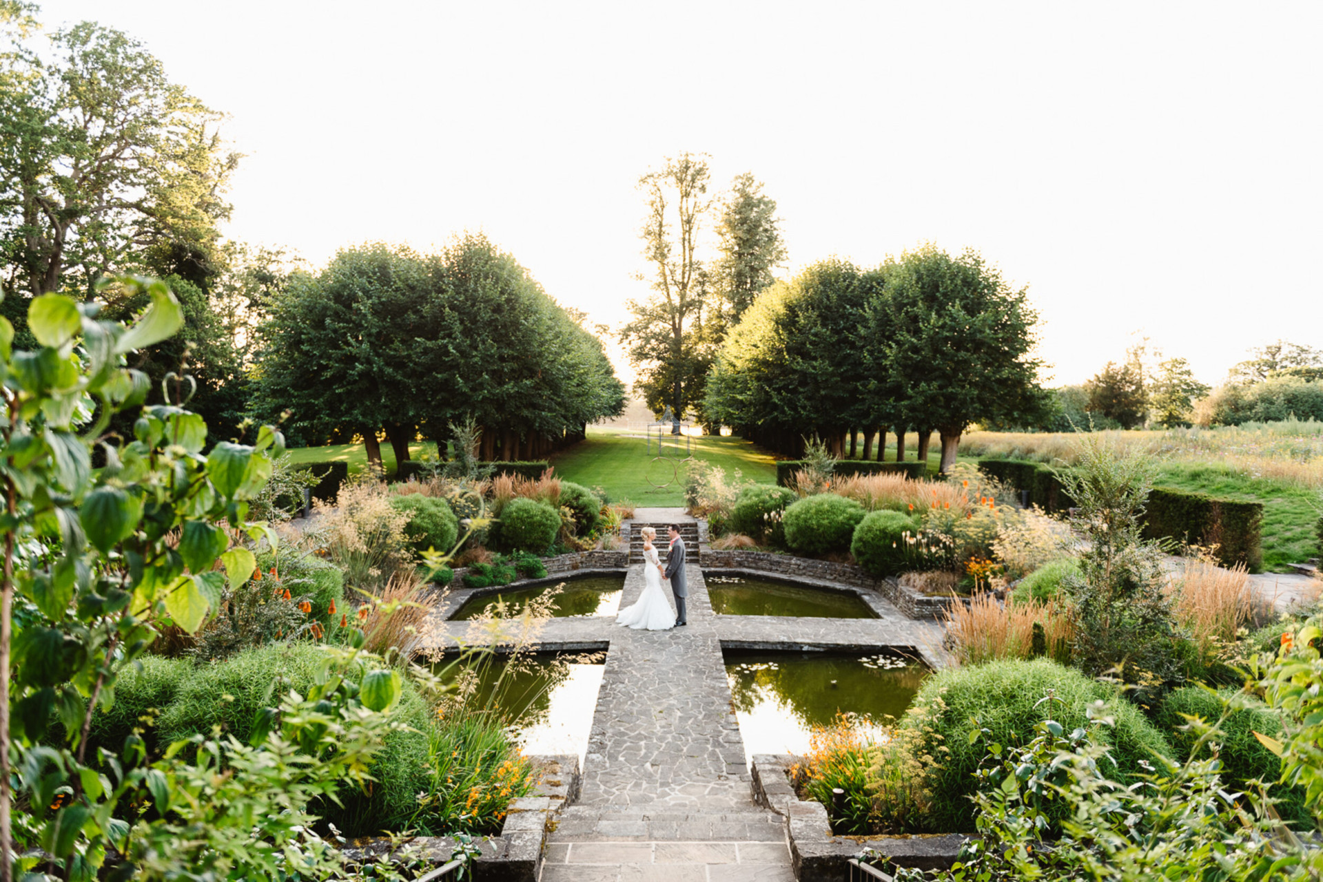 Coworth Park-Weddings-Sunken Gardencouple-Credit Fiona Kelly