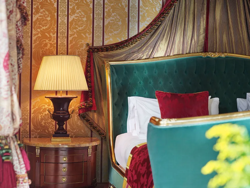 Presidential Suite master bedroom with a detail of the bed