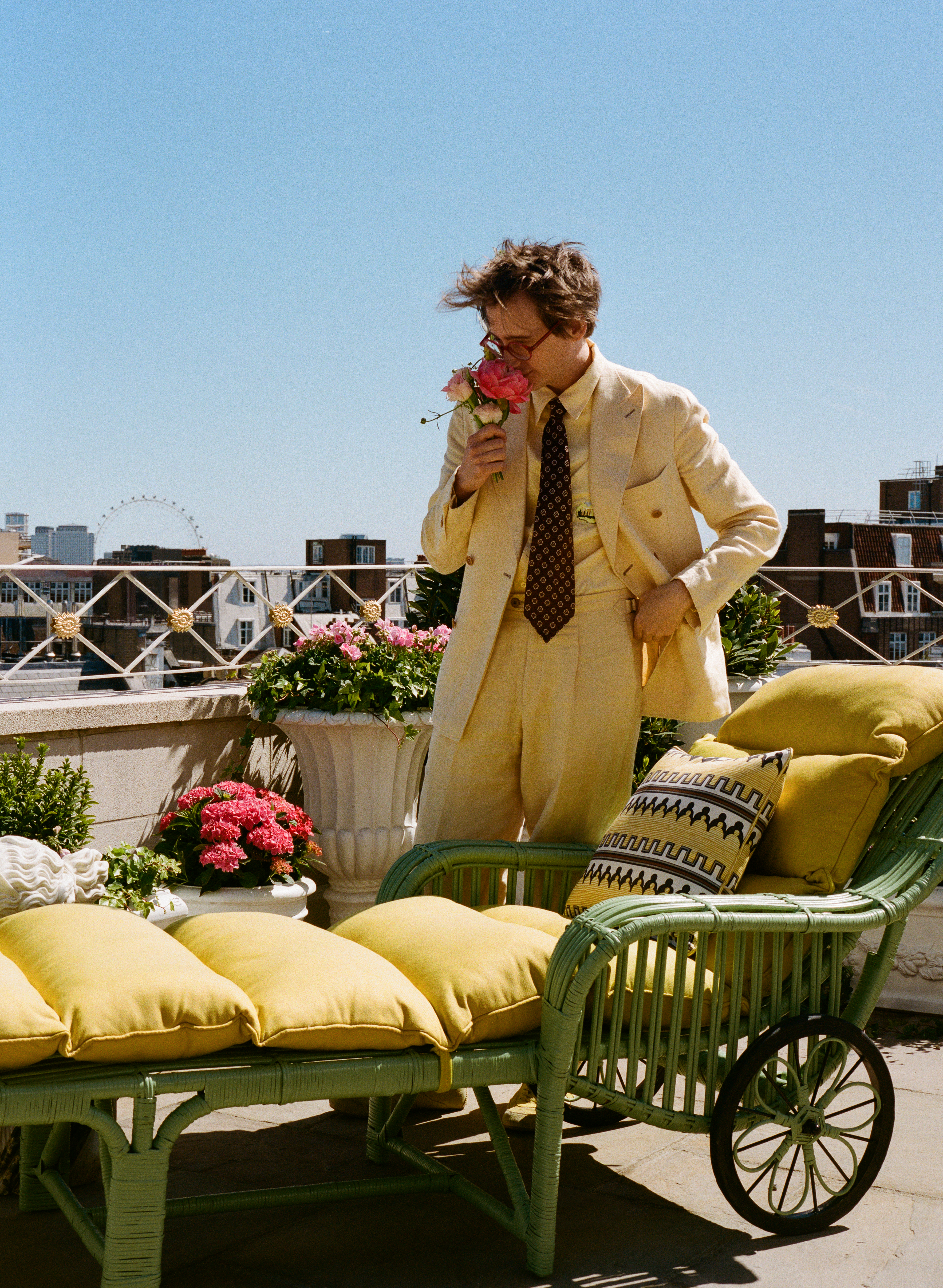 Luke Edward Hall on the Oliver Messel Suite Terrace at The Dorchester, stood next to his terrace designs