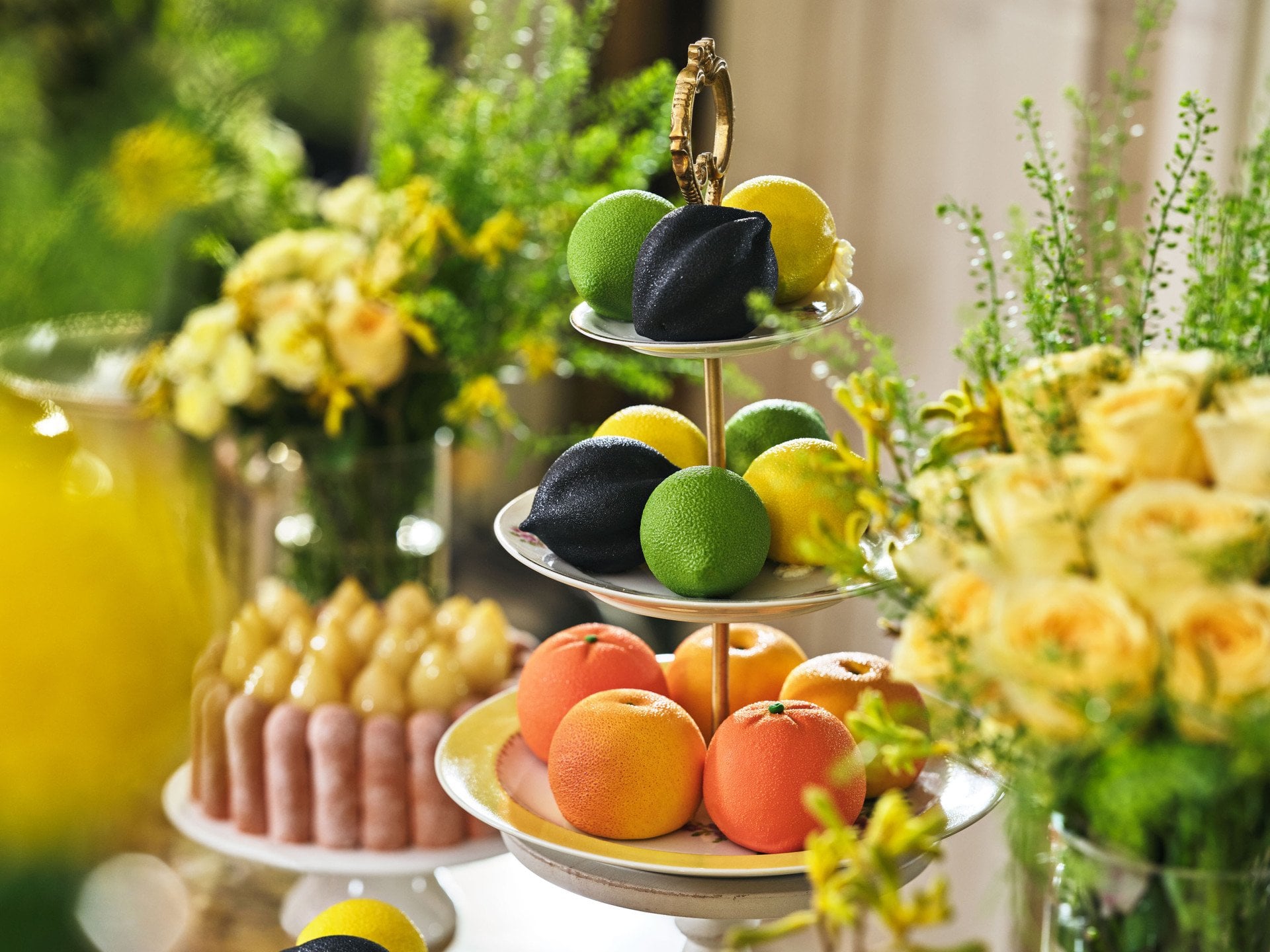 Details of the buffet with sculpted fruit cakes and flower arrangement in the Salon Tuileries at Le Meurice, Paris - Dorchester Collection