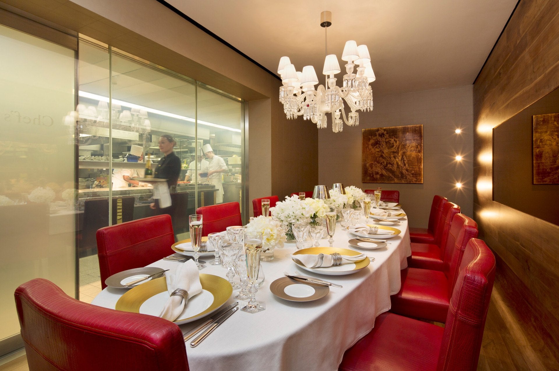 Chef's Table private dining, glass clear , dinner setup kitchen full view 