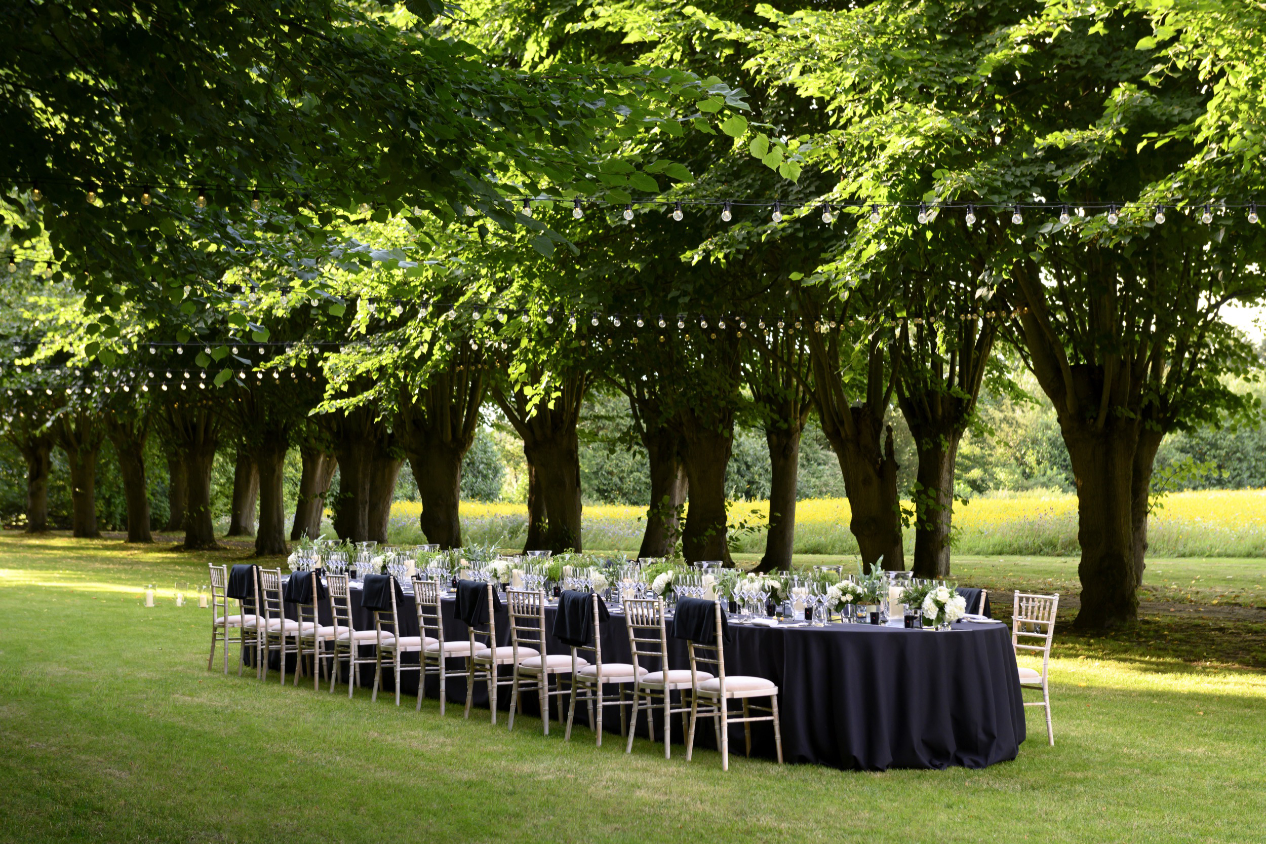 Dinner setting in the Lime Grove at Coworth Park, Ascot