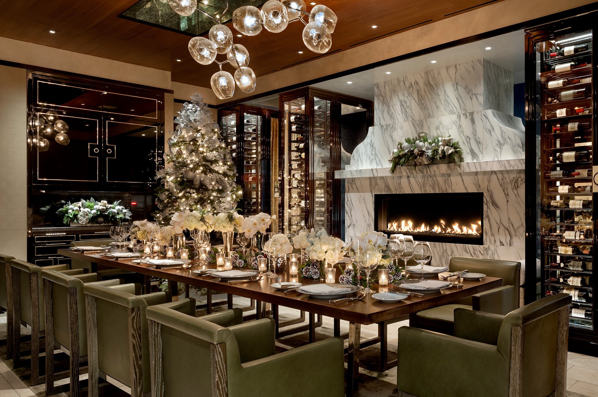 Long dining table set up for dinner with festive lights and decorations at Hotel Bel-Air