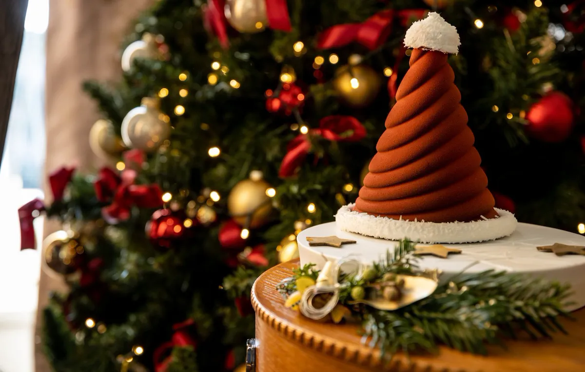 Chocolate Santa hat and Christmas tree inside suite at Hotel Eden, Rome