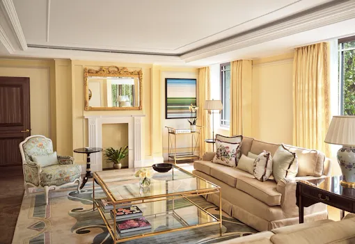 An elegantly designed living space in warm, cream tones