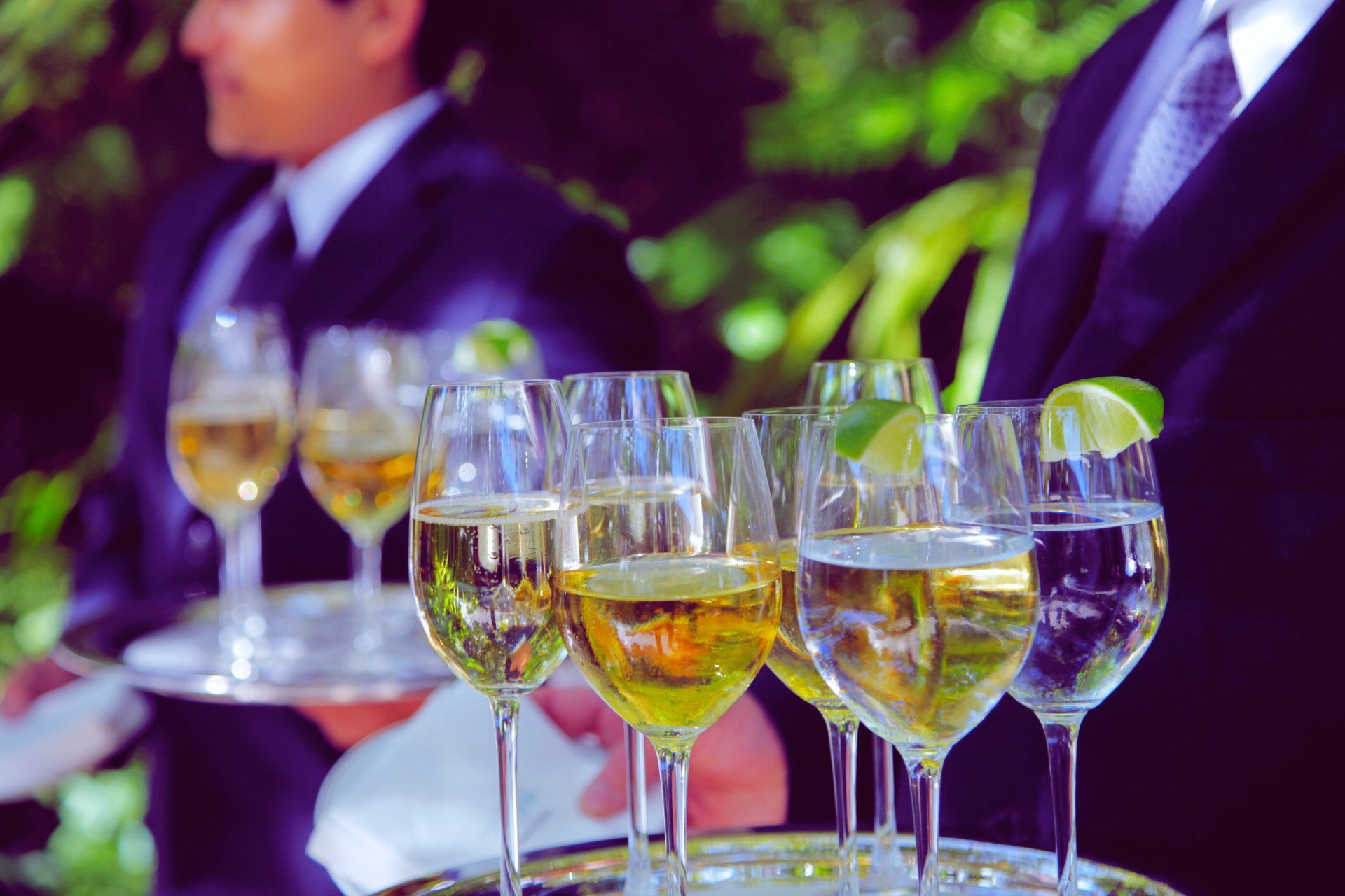 Close-up view of champagne glasses on a tray from a banquet event at Hotel Bel-Air. 