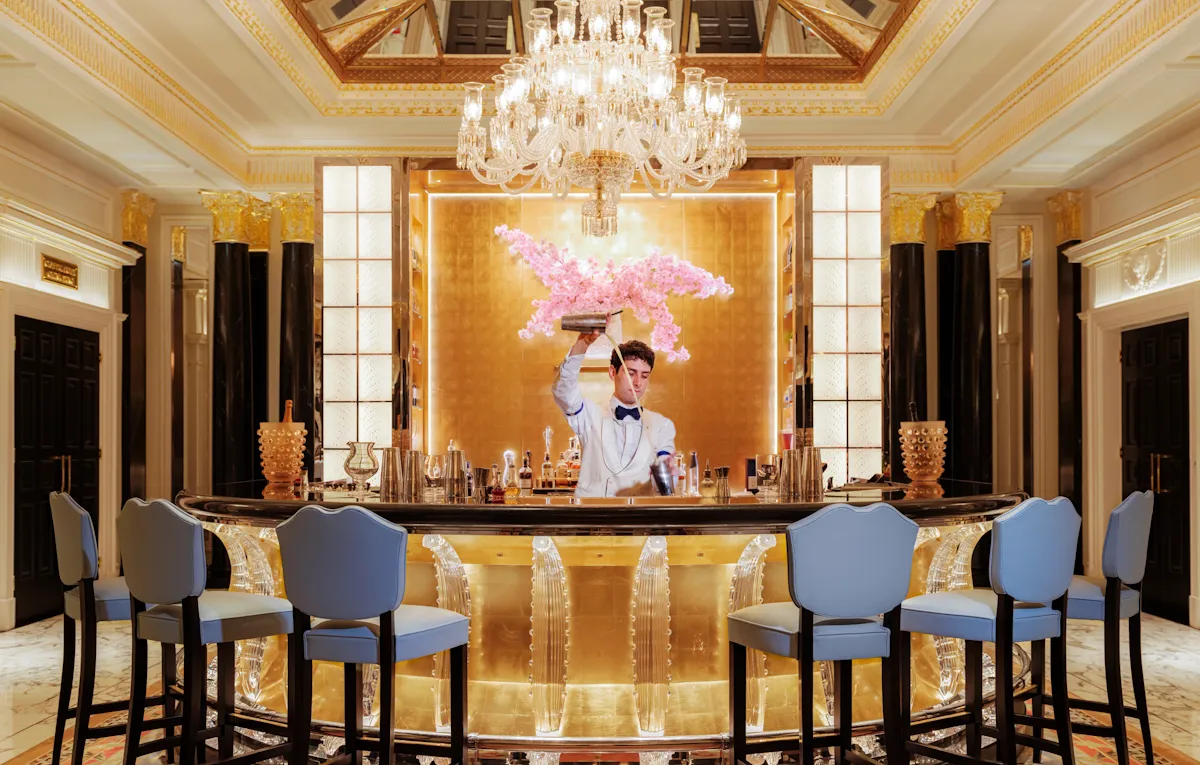 Artist Bar interior with bartender pouring the drink