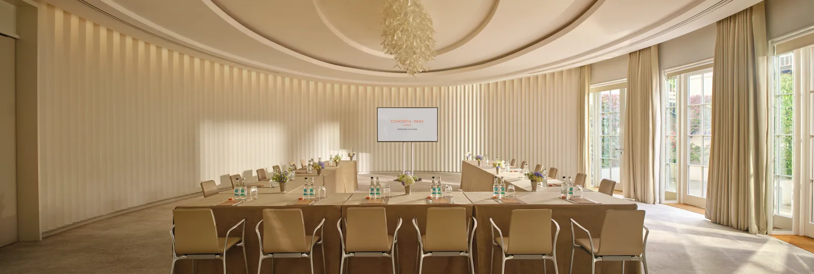 The Oval Room at Coworth Park configured for a corporate meeting