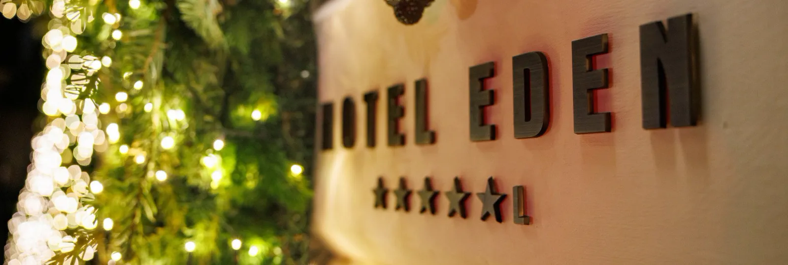 Detail of Hotel Eden facade with Christmas decorations
