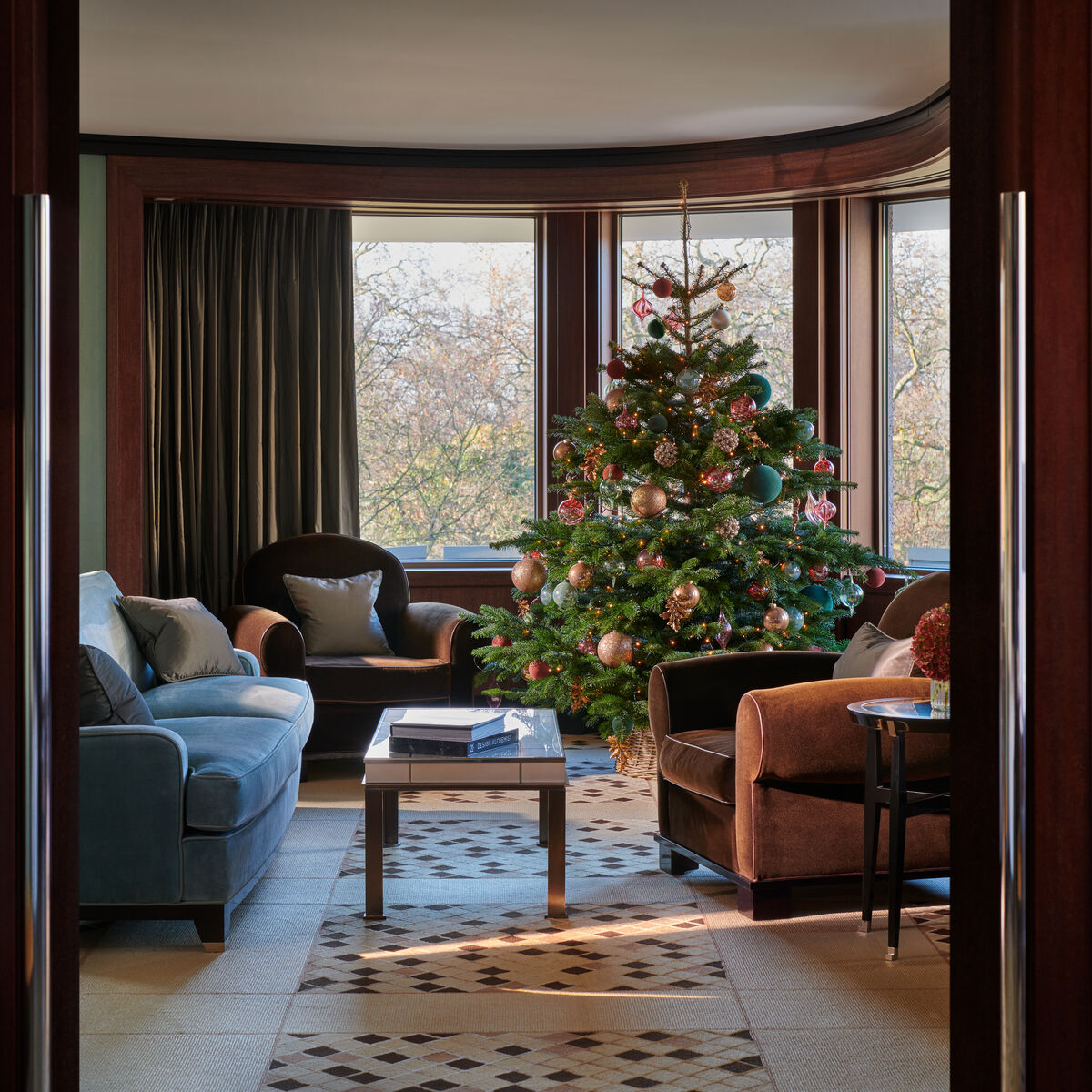 Luxury suite with festive decorations and holiday celebration setup at 45 Park Lane