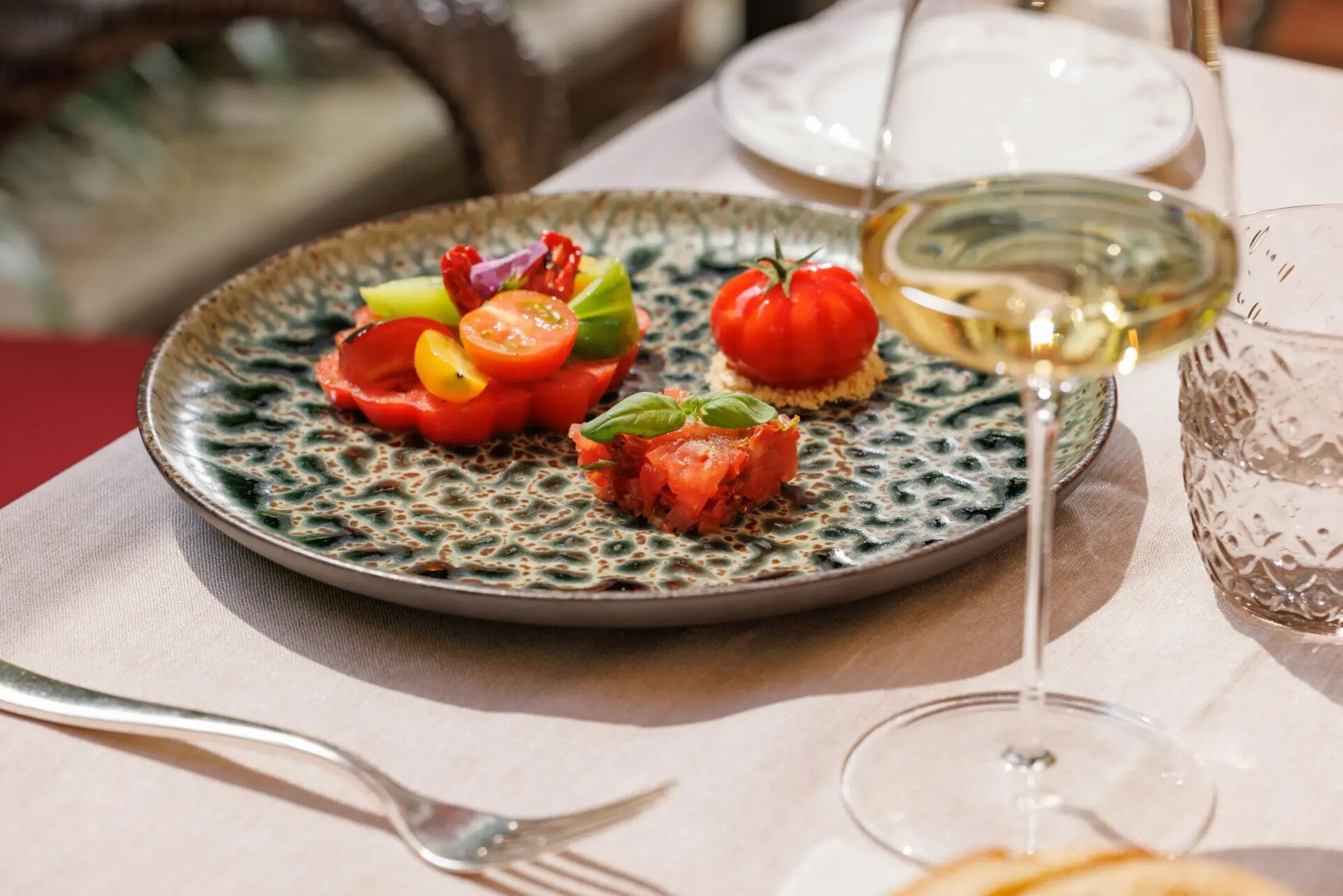 Our selection of tomatoes and burrata cheese served in the Acanto garden