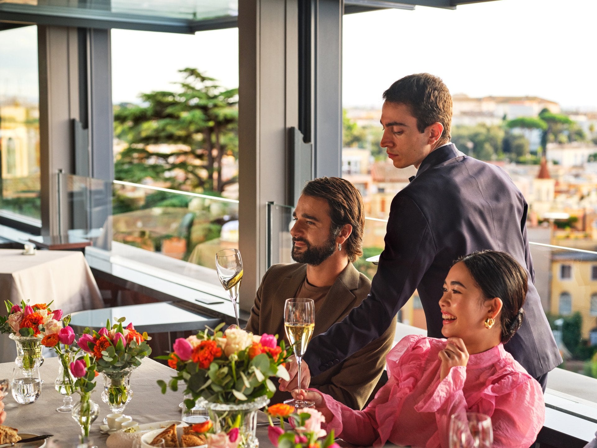Waiter serving a twosome at La Terrazza 