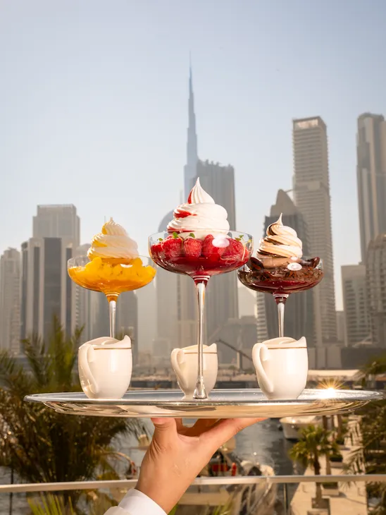The three different flavors of Vacherin in front of Dubai Skyline