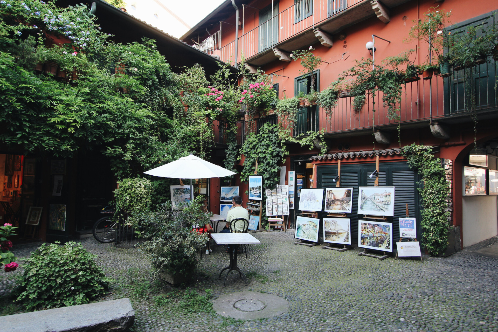 Cortile degli artisti (Artists courtyard - one of the most famous old courtyards) in Naviglio area with a detail of one of the painter resident 