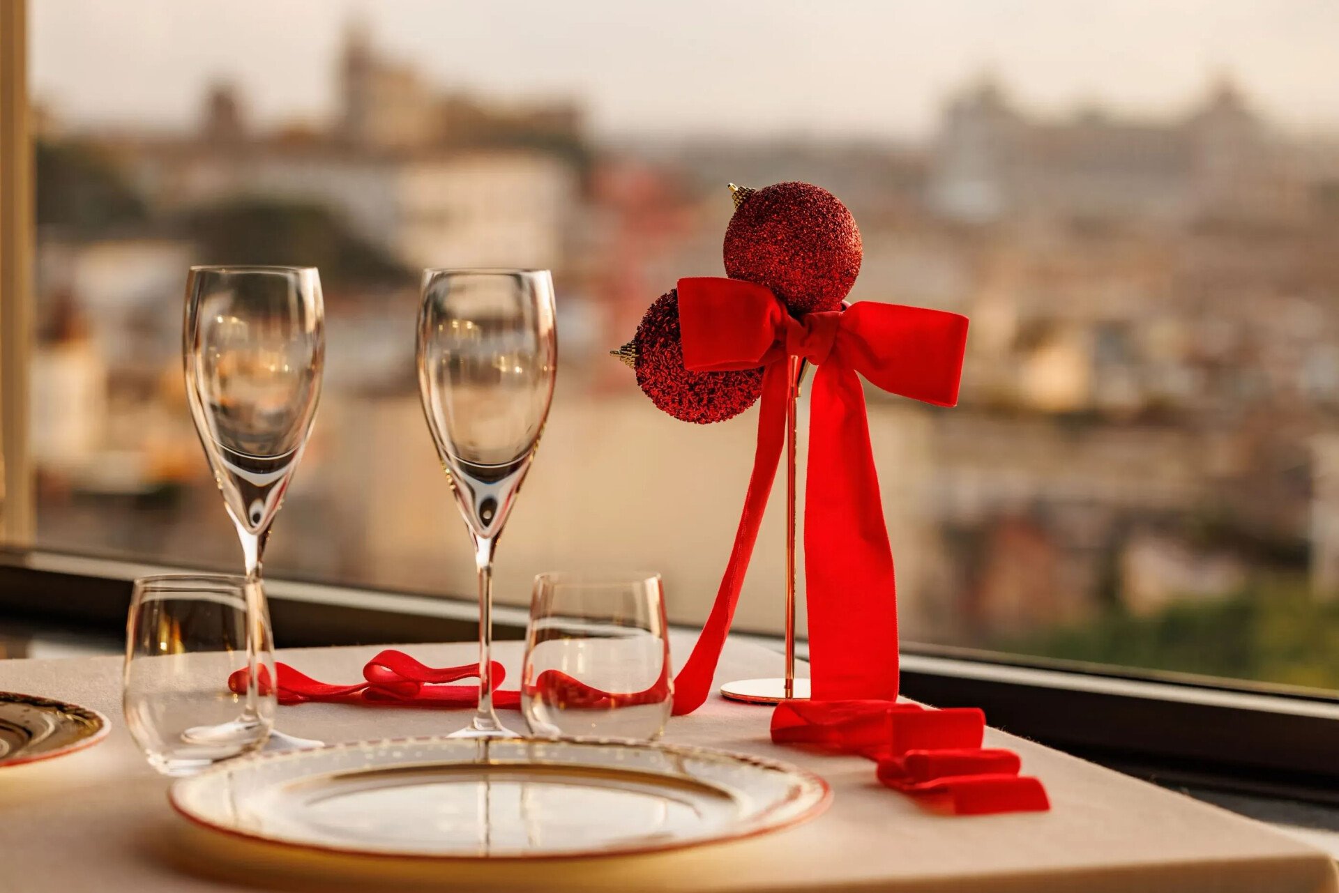 Red festive decorations on table at La Terrazza rooftop restaurant