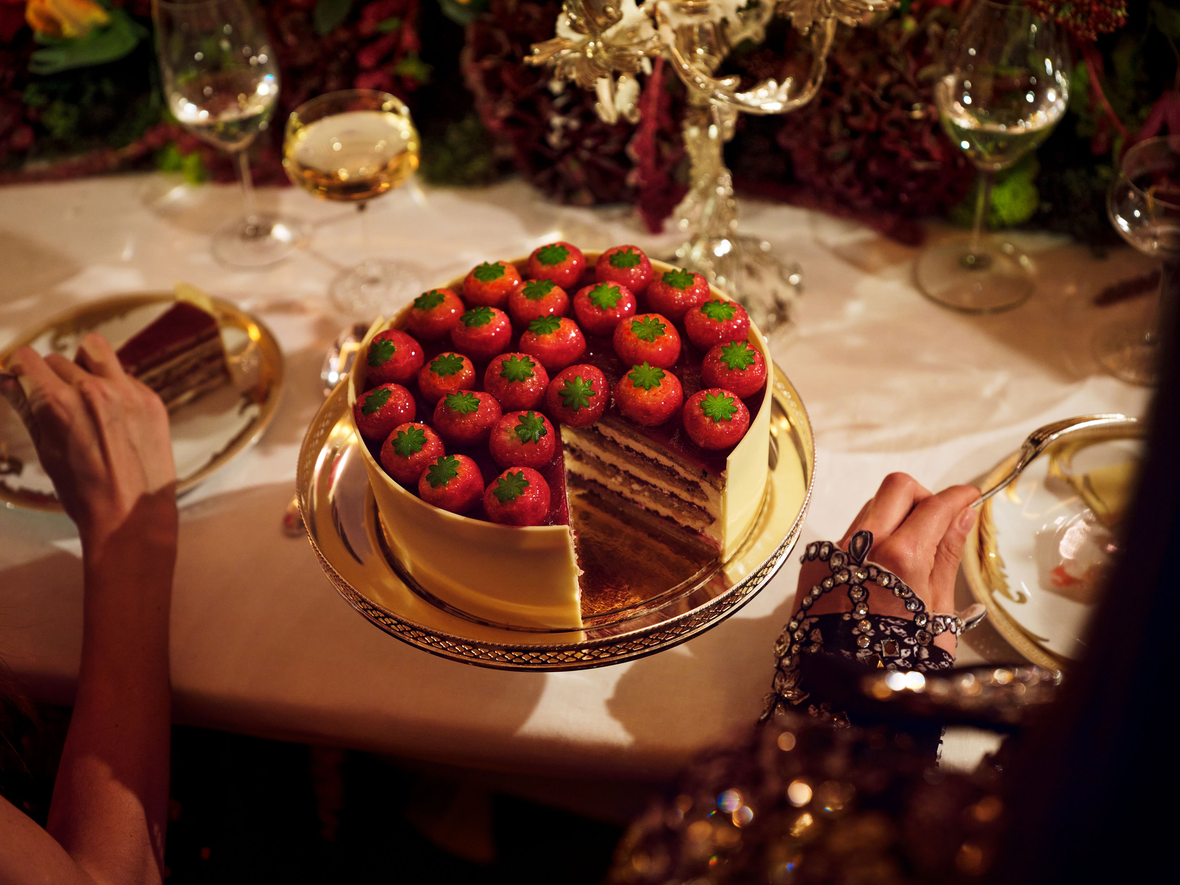 Photo of a strawberry cake at an event at the haute couture fair at the hotel plaza athenee
