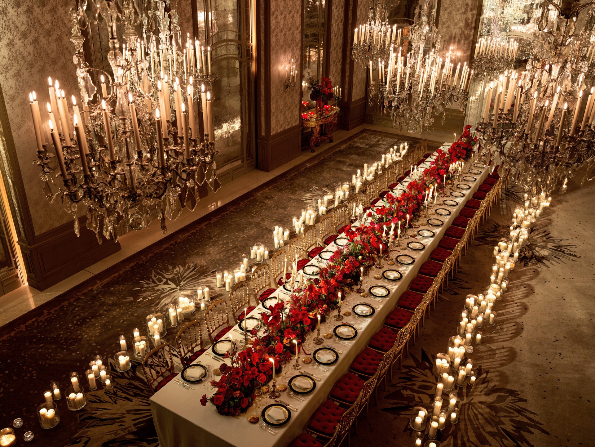 Chandelier behind the palm tree in Le Salon Haute Couture, at Hôtel Plaza Athénée, Paris - Dorchester Collection.