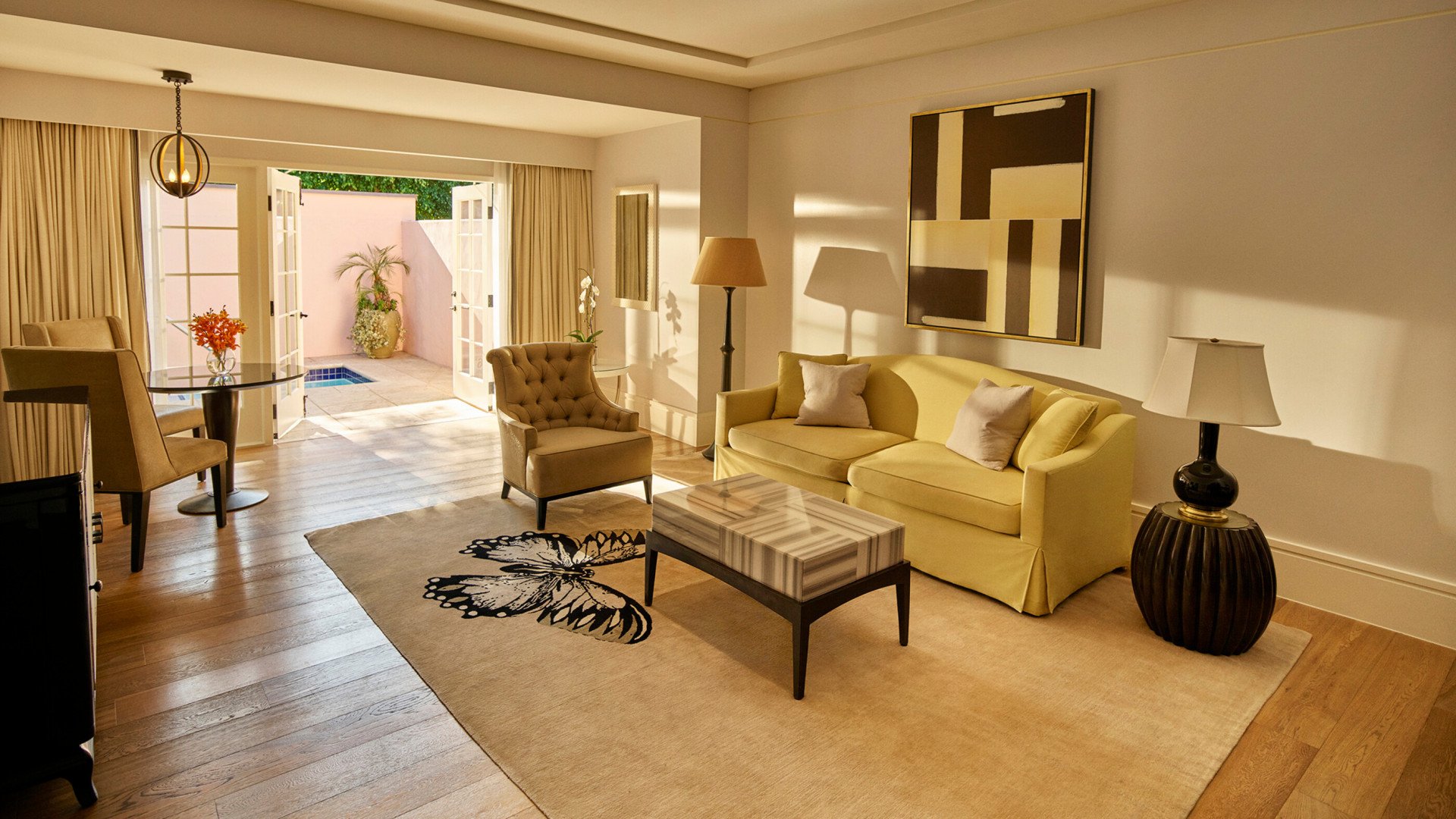 Living room leads to patio with private plunge pool at Hotel Bel-Air